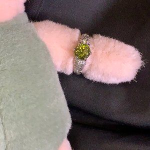 Silver Tone Ring with Green Peridot Colored Stone and Clear Pave Stones Size 8